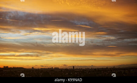 Glasgow, Scotland, UK. 22nd September. Stunning dawn over the west of the city gives hope for a fine day. Credit: gerard ferry/Alamy Live News Stock Photo