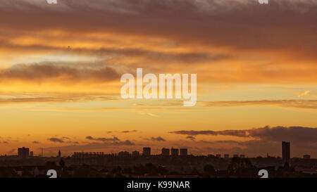 Glasgow, Scotland, UK. 22nd September. Stunning dawn over the west of the city gives hope for a fine day. Credit: gerard ferry/Alamy Live News Stock Photo