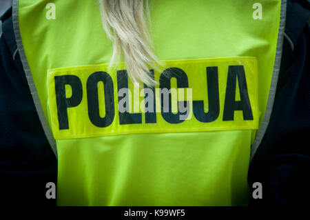 Bydgoszcz, Poland. 22nd Sep, 2017. The Polish word for police is seen on the safety jacket of a female police officer. Credit: Jaap Arriens/Alamy Live News Stock Photo