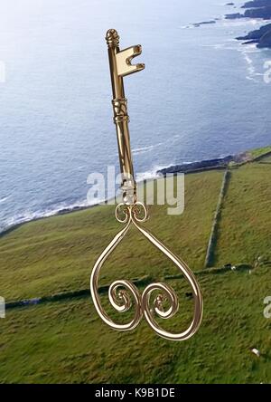 Digital composite of 3D Heart Key floating over landscape Stock Photo