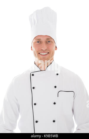 Portrait of happy mid adult male chef isolated over white background Stock Photo