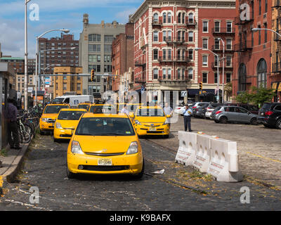 Hoboken, NJ USA -- September 19, 2017 --Yellow Taxi cabs are lined up outside the Hoboken bus and train terminal. Editorial Use Only. Editorial use on Stock Photo