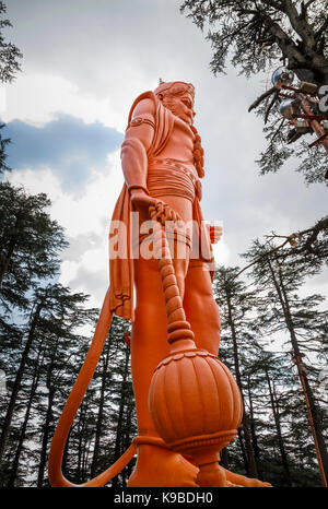 Giant orange statue of Hanuman, Hindu Jakhu Temple, Jakhu Hill, dedicated to monkey god Hanuman, Simla, Himachal Pradesh, northern India Stock Photo