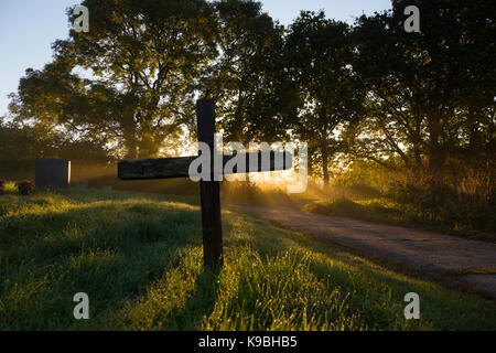 Plain wooden cross in English graveyard. Cowes, Isle of Wight, England, UK, Stock Photo