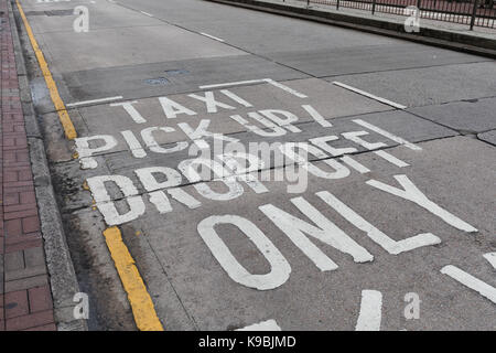 Taxi Pick Up and Drop Off Only Zone Stock Photo