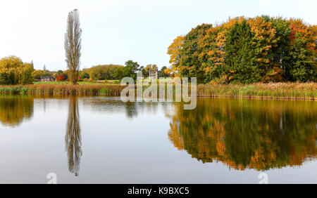 Tixall wide with Tixall gatehouse in the distant background at the Staffordshire and Worcestershire Canal at Tixall, Staffordshire, England, UK Stock Photo