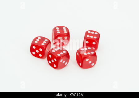 five red dices with six on the top Stock Photo