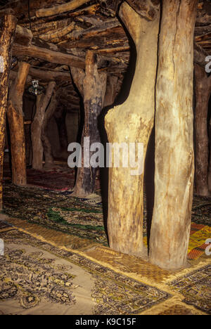 Samatiguila, Ivory Coast, Cote d'Ivoire.  Huge Timbers Support the Roof of the Oldest Mosque in Cote d'Ivoire, in Malinke Style. Stock Photo