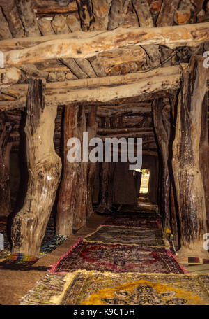 Samatiguila, Ivory Coast, Cote d'Ivoire.  Huge Timbers Support the Roof of the Oldest Mosque in Cote d'Ivoire, in Malinke Style. Stock Photo