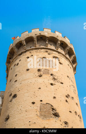 Torres de Quart Valencia, south tower of the Torres de Quart gate showing  heavy cannon ball damage from the Napoleonic war, Valencia, Spain. Stock Photo