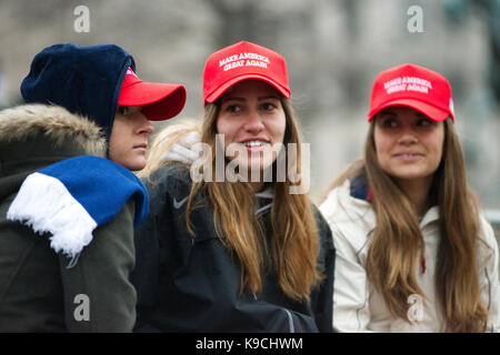 Washington DC, USA - January 20, 2017: Trump supporters gather along the parade route and at the National Mall to see Donald J. Trump sworn in as the 
