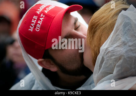 Washington DC, USA - January 20, 2017: Trump supporters kiss as Donald J. Trump is sworn in as the 45th President of the United States during the Inau Stock Photo