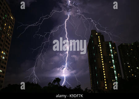 Incredible Real Lightning Striking on Night Sky of Bangkok' s Urban, Monsoon Season in Thailand Stock Photo