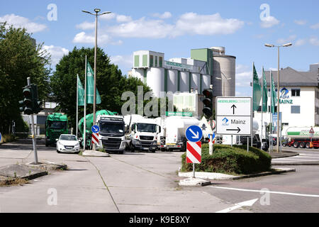 Mainz, Germany - June 10, 2017: Parking trucks are parked in front of the entrance to Heidelberg cement plant on June 10, 2017 in Mainz. Stock Photo