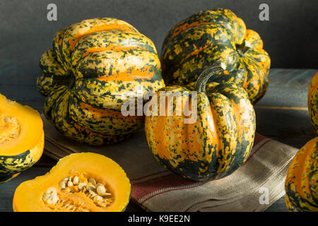Raw Orange Conffeti Acorn Squash Ready to Cook With Stock Photo