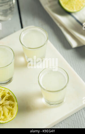 Boozy Lime  and Vodka Kamikaze Shots Ready to Drink Stock Photo