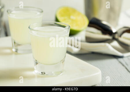 Boozy Lime  and Vodka Kamikaze Shots Ready to Drink Stock Photo