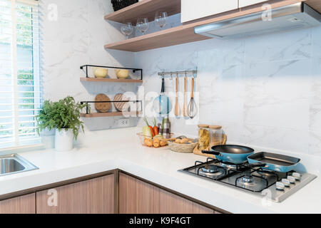 Cooking background. Flat kitchen accessories. Apron and silicone cooking  utensil with wooden handle on beige background with copy space. Top view  Flat Stock Photo - Alamy