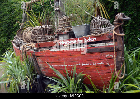 Old Red Wooden Fishing Boat on Display at the Entrance to the Eden Project, Cornwall, England, UK. Lantern Stock Photo
