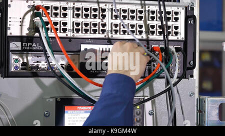 Networking service. network engineer administrator checking server hardware equipment of data center Stock Photo
