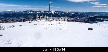 Babia Gora, Pilsko, Tatras mountain range, Mala Fatra mountain range from Barania Gora hill in Silesian Beskids mountains in Poland during nice winter Stock Photo