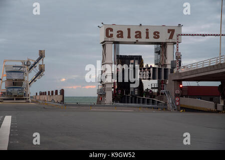 Loading ramp on dock 7 at Calais ferry port, dusk Stock Photo