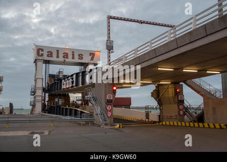 Loading ramp on dock 7 at Calais ferry port, dusk Stock Photo