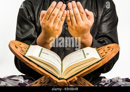 muslim man praying for Allah, muslim God Stock Photo