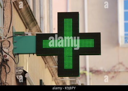 Pharmacy Neon Sign. Pharmacy store in France Stock Photo