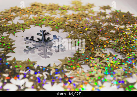 snowflake inside golden sequins Stock Photo
