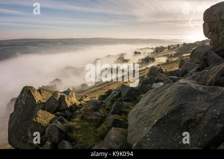 UK Weather: Ilkley, West Yorkshire, UK. 23rd Sep, 2017. Atmospheric autumnal mist creeps through Wharfedale on Ilkley Moor this morning. Credit: Rebecca Cole/Alamy Live News