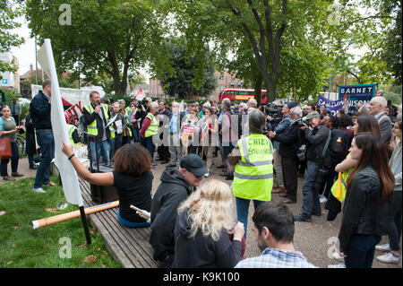 London, UK. 23rd Sep, 2017. Protesters gathered around the speaker to listen to his speech. Social housing supporters gather in Harringay for the Social housing not Social cleansing, march and demonstration. On September 23, 2017 in London, United Kingdom. Credit: SOPA Images Limited/Alamy Live News Stock Photo