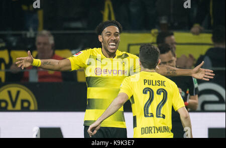 Dortmund's Pierre-Emerick Aubameyang (R) celebrates with teammate Christian Pulisic after completing his hat-trick and giving his side a 5:0 lead during the German Bundesliga soccer match between Borussia Dortmund and Borussia Mönchengladbach in the Signal Iduna Park stadium in Dortmund, Germany, 23 September 2017. Aubameyang scored a hat-trick while Philipp bagged two of the team's six goals. (EMBARGO CONDITIONS - ATTENTION: Due to the accreditation guidelines, the DFL only permits the publication and utilisation of up to 15 pictures per match on the internet and in online media during th Stock Photo