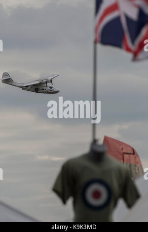 Duxford, UK. 23rd Sep, 2017. A Consolidated PBY-5A Catalina flying boat does its display - Duxford Battle of Britain Air Show taking place during IWM (Imperial War Museum) Duxford's centenary year. Duxford's principle role as a Second World War fighter station is celebrated at the Battle of Britain Air Show by more than 40 historic aircraft taking to the skies. Credit: Guy Bell/Alamy Live News Stock Photo