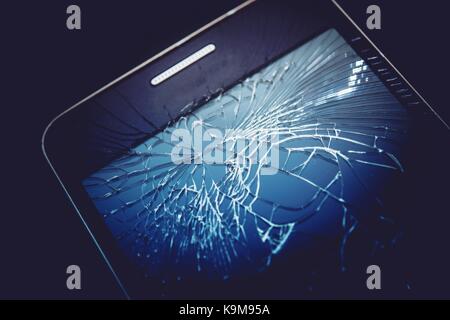 Damaged Smartphone Display. Cracked Screen Glass Stock Photo
