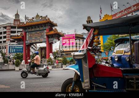 Traffic, in Chinatown Gate, known as the Wongwian Odeon, in Bangkok, Thailand Stock Photo