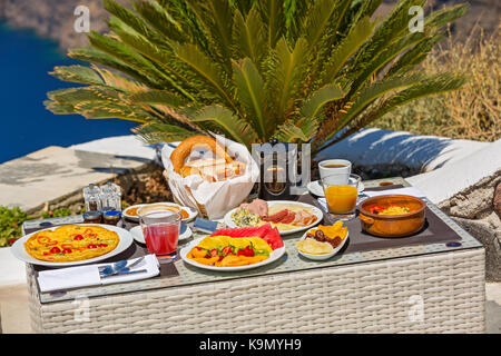 Romantic Breakfast for two on the seashore Stock Photo