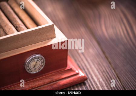 Storage of cigars in humidor. Stock Photo