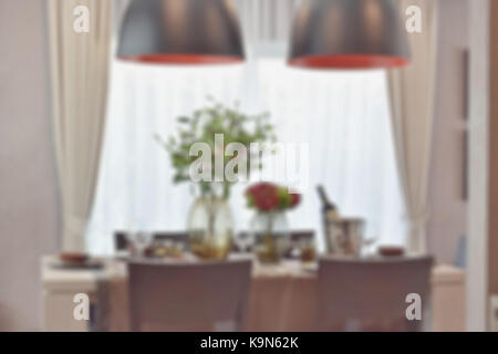 blur image of modern classic dining set in luxury dining room Stock Photo