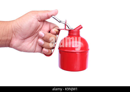 hand holding red bottle pumping on isolated Stock Photo