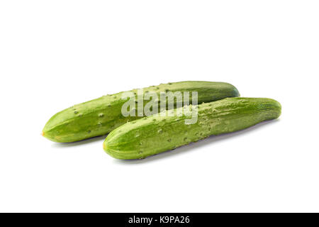 Two fresh cucumbers on white Stock Photo