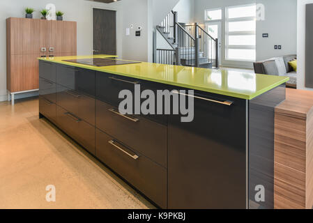 Modern kitchen  with green  quartz  counter top close up 