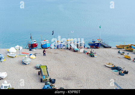 Boats and fishing equipment on the beach at Beer, English Seaside Coastal town, East Devon Coast, England, UK Stock Photo