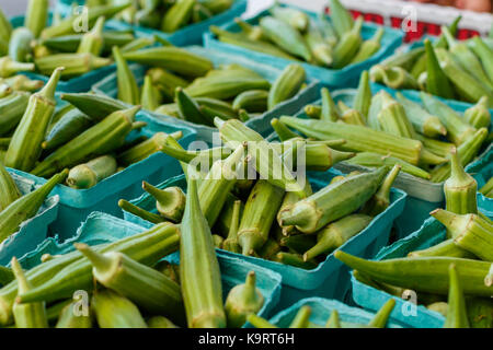 Fresh Okra at a produce stand. Stock Photo