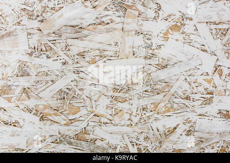 White painted one layer oriented strand board OSB. Vintage OSB. Stock Photo