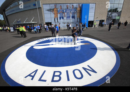 Fans arrive at the ground before the Premier League match at the AMEX Stadium, Brighton.