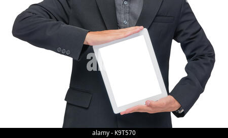 Businessman holding tablet in black suit on white background Stock Photo