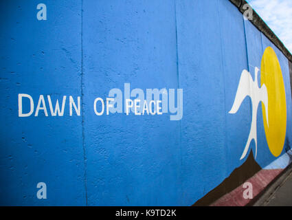 The East Side Gallery's murales are the street-art in Berlin, painted on their own famous wall Stock Photo