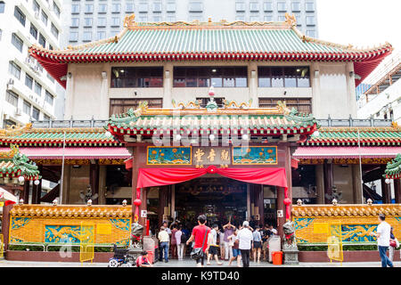 SINGAPORE - SEPTEMBER 7, 2017: Worshippers flock to the historical Kwan Im Thong Hood Cho Temple on Waterloo Street during the Hungry Ghost Festival.  Stock Photo