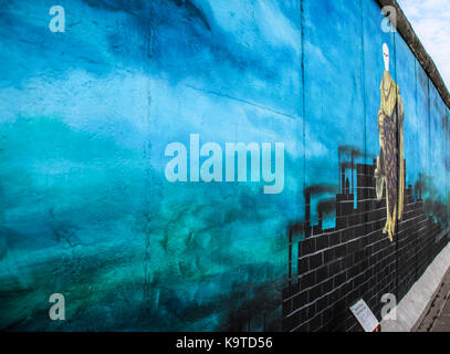 The East Side Gallery's murales are the street-art in Berlin, painted on their own famous wall Stock Photo